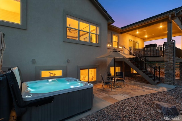 exterior space featuring a hot tub