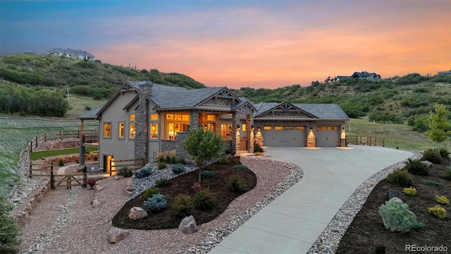 craftsman inspired home with a garage