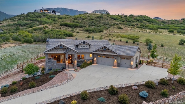 craftsman-style home featuring a mountain view