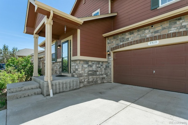9919 Memphis St, Commerce City, CO 80022 - exterior space featuring stone siding and concrete driveway