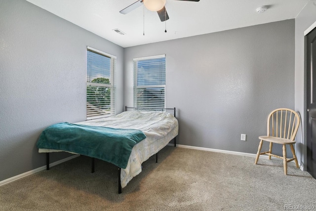 9919 Memphis St, Commerce City, CO 80022 - bedroom featuring baseboards, carpet floors, ceiling fan, and a textured wall