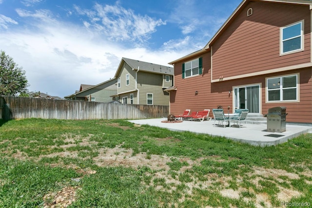 9919 Memphis St, Commerce City, CO 80022 - rear view of house with a patio