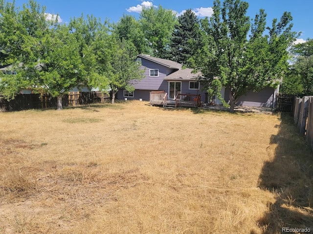 view of yard featuring a deck