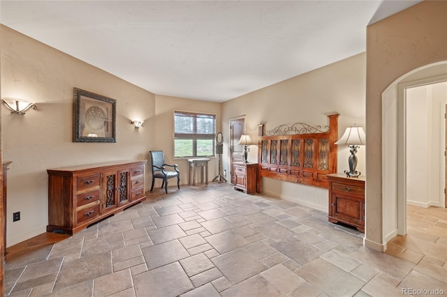 28098 Green Valley Ln, Conifer, CO 80433 - sitting room featuring stone tile flooring and baseboards