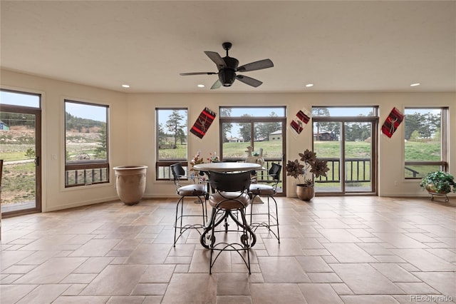 28098 Green Valley Ln, Conifer, CO 80433 - dining room featuring recessed lighting, baseboards, ceiling fan, and stone tile floors