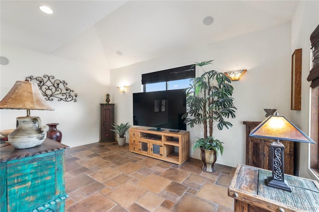 28098 Green Valley Ln, Conifer, CO 80433 - living area with stone finish floors, baseboards, and high vaulted ceiling