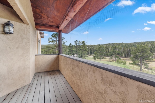 28098 Green Valley Ln, Conifer, CO 80433 - balcony with a wooded view