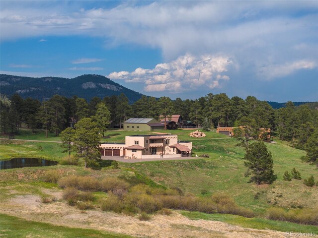 28098 Green Valley Ln, Conifer, CO 80433 - mountain view featuring a heavily wooded area and a nearby body of water