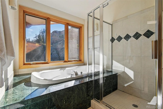 9041 Eastridge Rd, Golden, CO 80403 - full bath with a stall shower and a garden tub