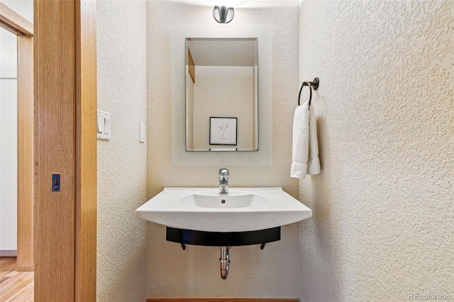 9041 Eastridge Rd, Golden, CO 80403 - bathroom with a textured wall and a sink