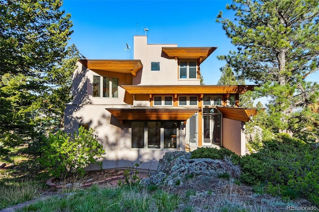 9041 Eastridge Rd, Golden, CO 80403 - rear view of property with stucco siding