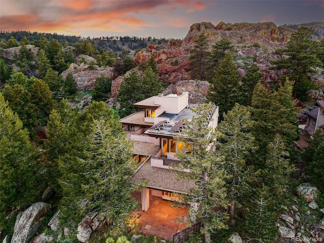 9041 Eastridge Rd, Golden, CO 80403 - aerial view at dusk of a wooded view