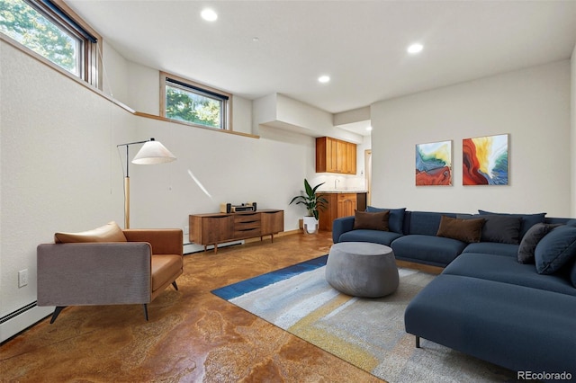 9041 Eastridge Rd, Golden, CO 80403 - living room with recessed lighting, a baseboard radiator, and concrete floors