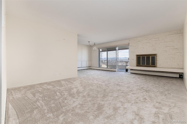 unfurnished living room featuring light colored carpet, a stone fireplace, and a baseboard radiator