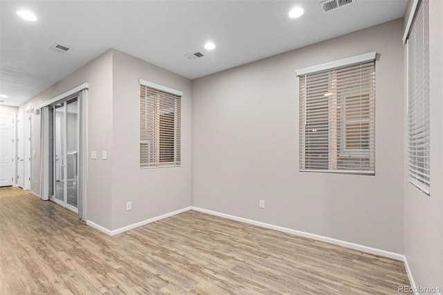 23630 E 5th Pl, Aurora, CO 80018 - unfurnished room with recessed lighting and light wood-style floors