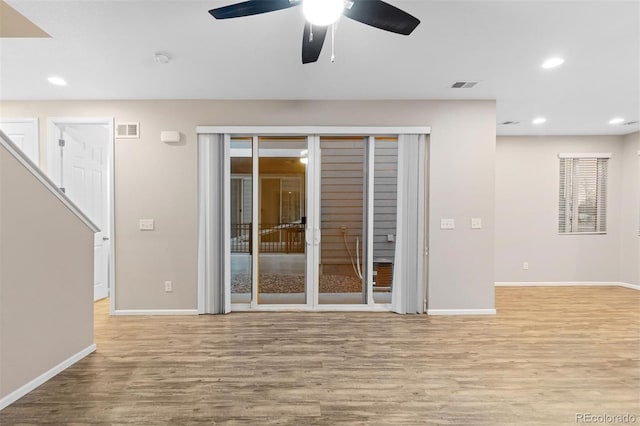 23630 E 5th Pl, Aurora, CO 80018 - empty room with wood finished floors, recessed lighting, a ceiling fan, and a smoke detector
