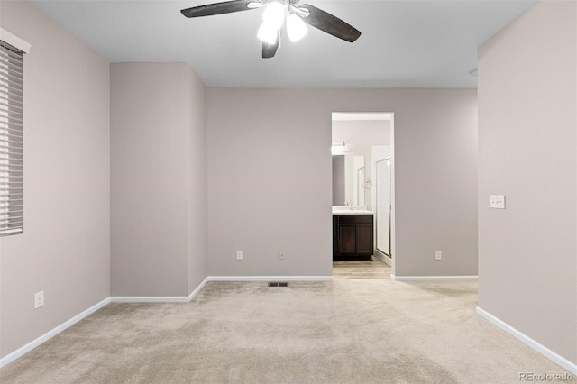 23630 E 5th Pl, Aurora, CO 80018 - empty room featuring light colored carpet and a ceiling fan