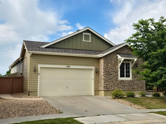 483 W 172nd Pl, Broomfield, CO 80023 - craftsman-style home with driveway, an attached garage, board and batten siding, stone siding, and roof with shingles