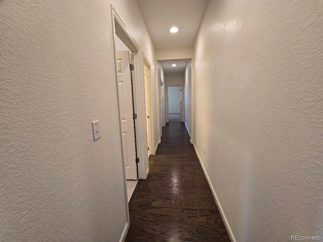 483 W 172nd Pl, Broomfield, CO 80023 - corridor featuring a textured wall, baseboards, wood finished floors, and recessed lighting