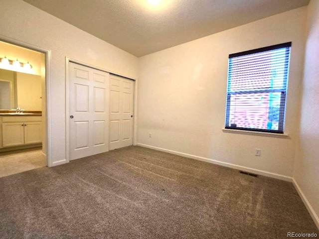 483 W 172nd Pl, Broomfield, CO 80023 - unfurnished bedroom featuring carpet, a sink, baseboards, connected bathroom, and a closet