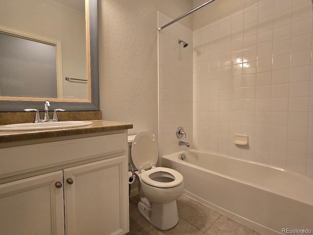 483 W 172nd Pl, Broomfield, CO 80023 - bathroom featuring toilet, a textured wall, vanity, bathing tub / shower combination, and tile patterned floors