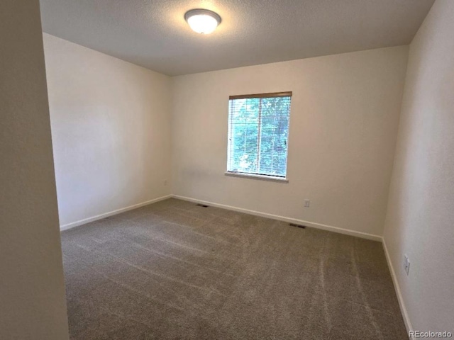 483 W 172nd Pl, Broomfield, CO 80023 - unfurnished room featuring carpet floors, baseboards, and a textured ceiling