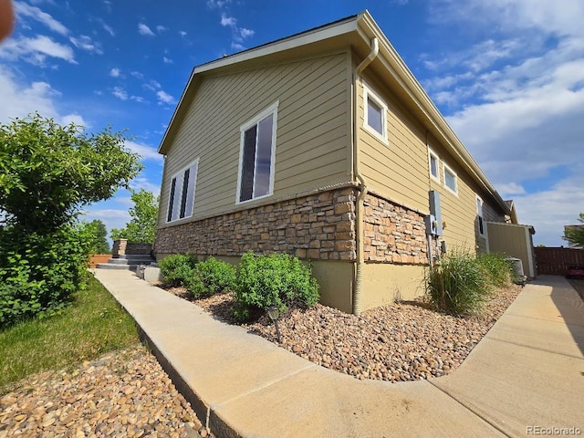 483 W 172nd Pl, Broomfield, CO 80023 - view of side of home featuring stone siding