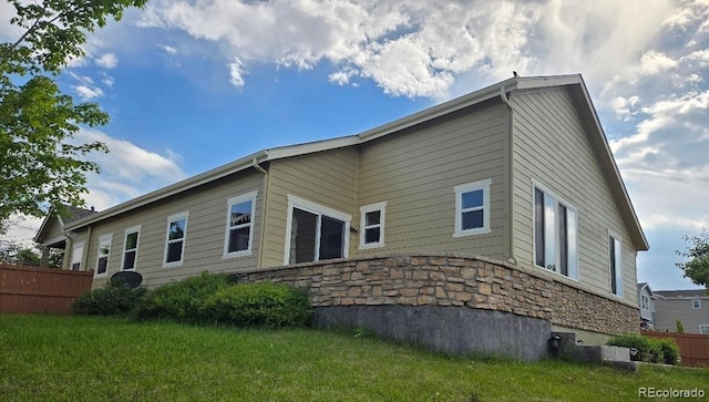 483 W 172nd Pl, Broomfield, CO 80023 - back of house featuring stone siding