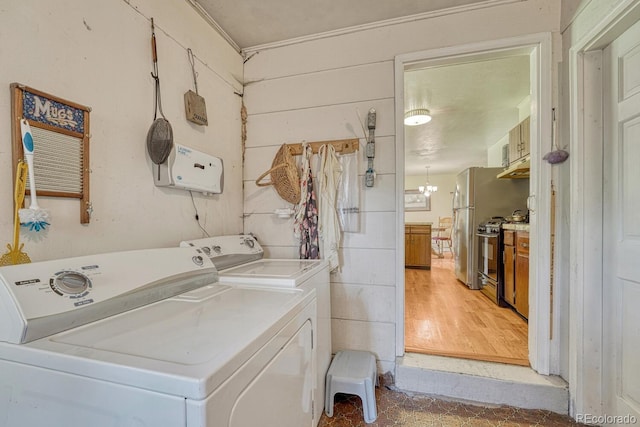 7479 Pierce St, Arvada, CO 80003 - washroom with washer and dryer and tile patterned floors