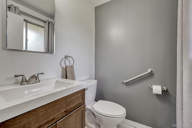 7479 Pierce St, Arvada, CO 80003 - bathroom featuring toilet and vanity