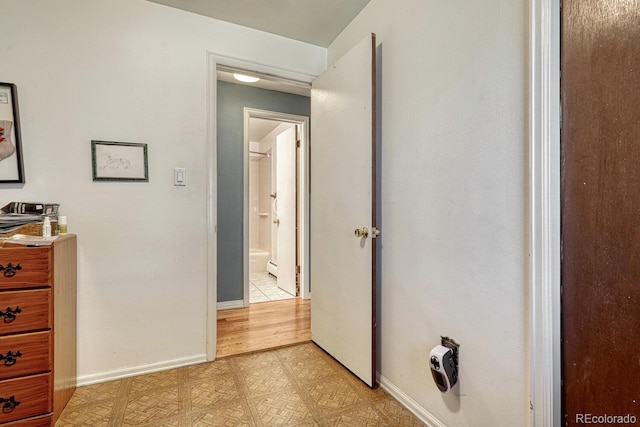7479 Pierce St, Arvada, CO 80003 - bedroom featuring baseboards and connected bathroom