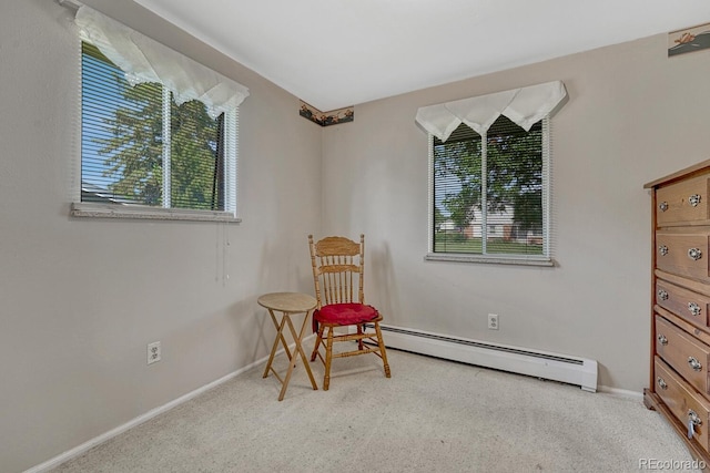 7479 Pierce St, Arvada, CO 80003 - sitting room with baseboard heating and carpet floors
