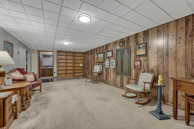 7479 Pierce St, Arvada, CO 80003 - living area with carpet flooring and wooden walls