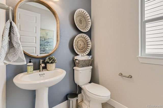 17719 Prairie Peak Trl, Parker, CO 80134 - half bathroom featuring toilet and baseboards