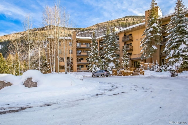 view of snow covered building