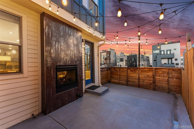 view of patio / terrace featuring fence