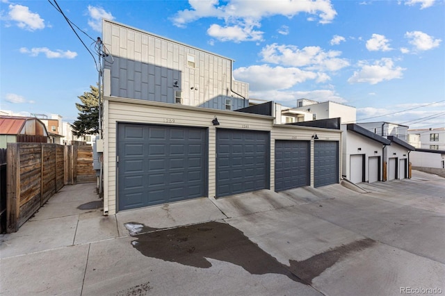 garage featuring fence