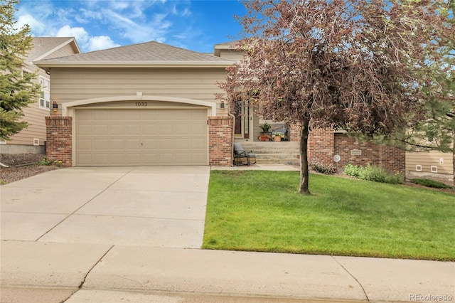1033 Bramblewood Dr, Castle Pines, CO 80108 - view of front of home featuring brick siding, an attached garage, concrete driveway, and a front yard