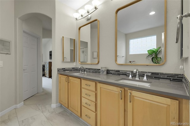 1033 Bramblewood Dr, Castle Pines, CO 80108 - bathroom with marble finish floors and double vanity
