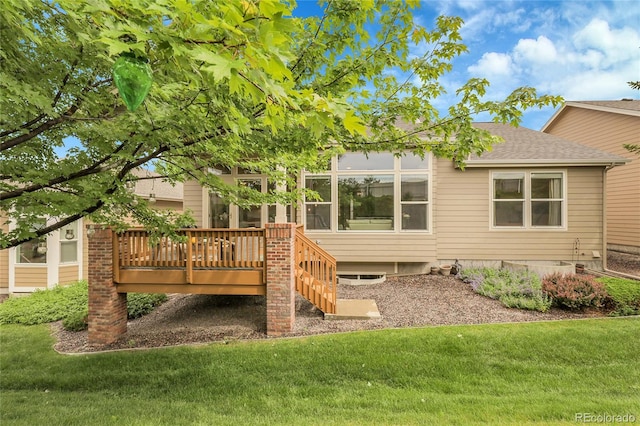 1033 Bramblewood Dr, Castle Pines, CO 80108 - back of property featuring a deck, a lawn, stairs, and roof with shingles