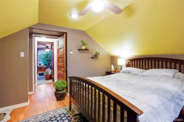4210 S Fox St, Englewood, CO 80110 - bedroom featuring wood finished floors, lofted ceiling, baseboards, and a ceiling fan