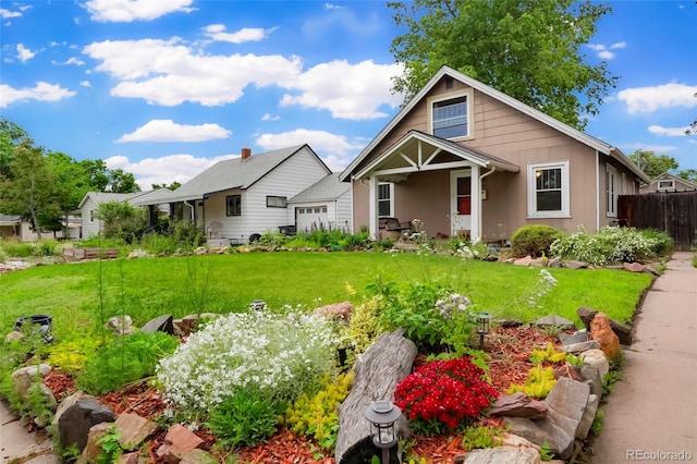4210 S Fox St, Englewood, CO 80110 - view of front of property with an attached garage