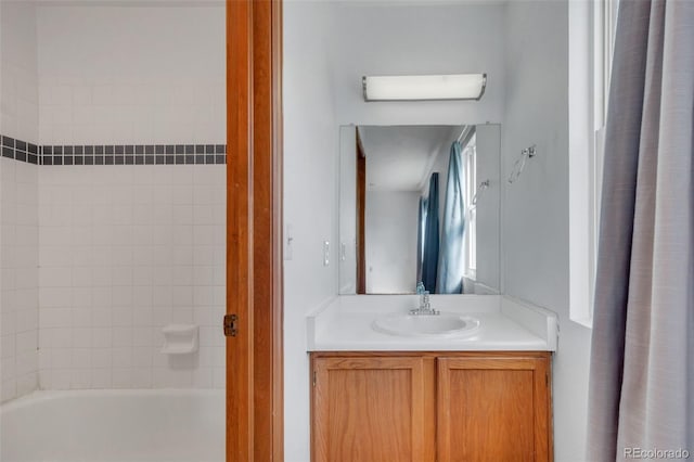 8911 W Yale Ave, Lakewood, CO 80227 - full bathroom with bathing tub / shower combination and vanity
