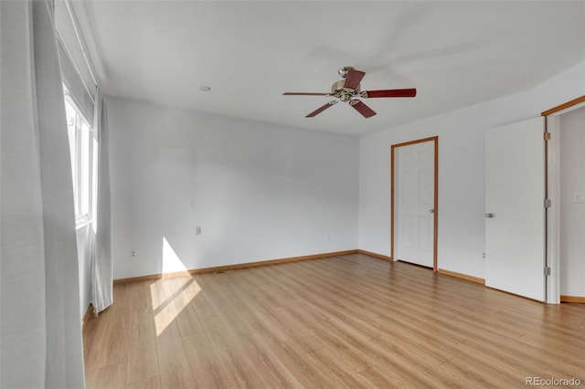 8911 W Yale Ave, Lakewood, CO 80227 - empty room featuring light wood-type flooring, ceiling fan, and baseboards
