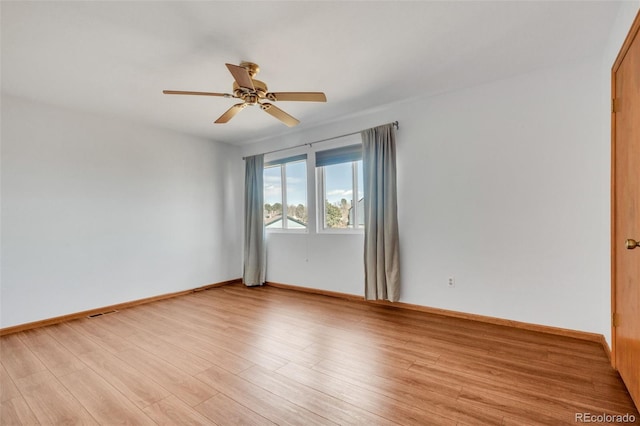 8911 W Yale Ave, Lakewood, CO 80227 - unfurnished room featuring ceiling fan, light wood-style flooring, and baseboards