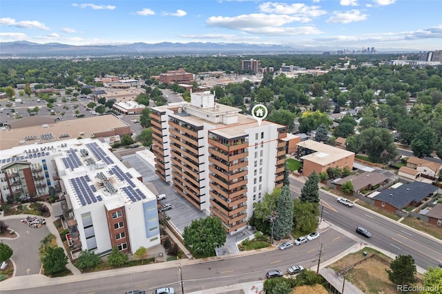 drone / aerial view with a city view and a mountain view