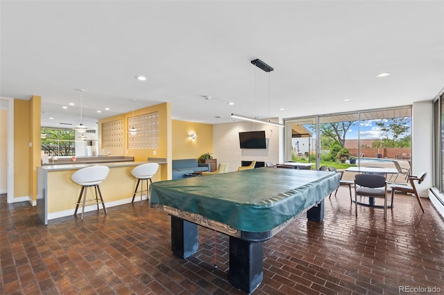 rec room with billiards, recessed lighting, brick floor, and baseboards