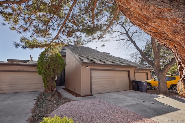 exterior space with a garage