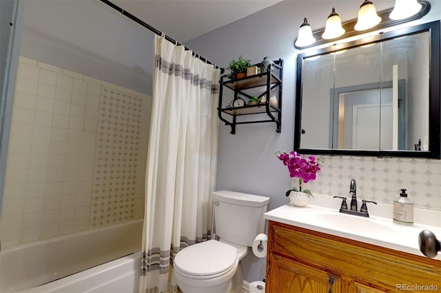 8217 Club Crest Dr, Arvada, CO 80005 - bathroom featuring vanity, shower / bath combo with shower curtain, and tasteful backsplash