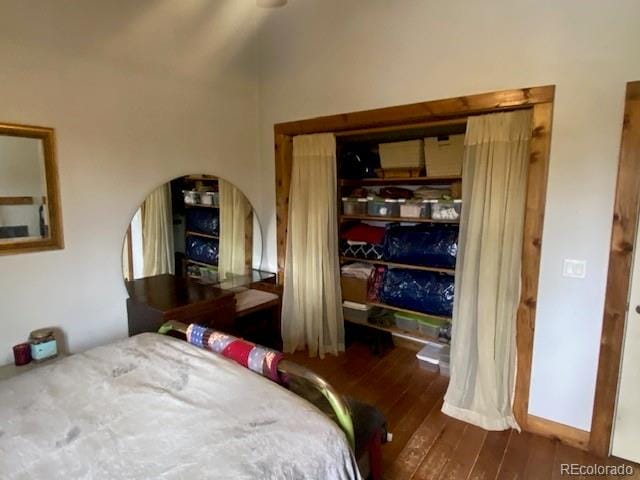 bedroom featuring dark hardwood / wood-style floors